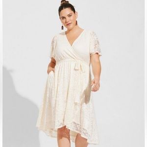 Torrid lace wrap dress with tie. Beautiful, flattering, stretchy! Pockets!